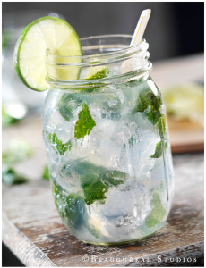 A cool mint mojito, garnished with lime and mint leaves